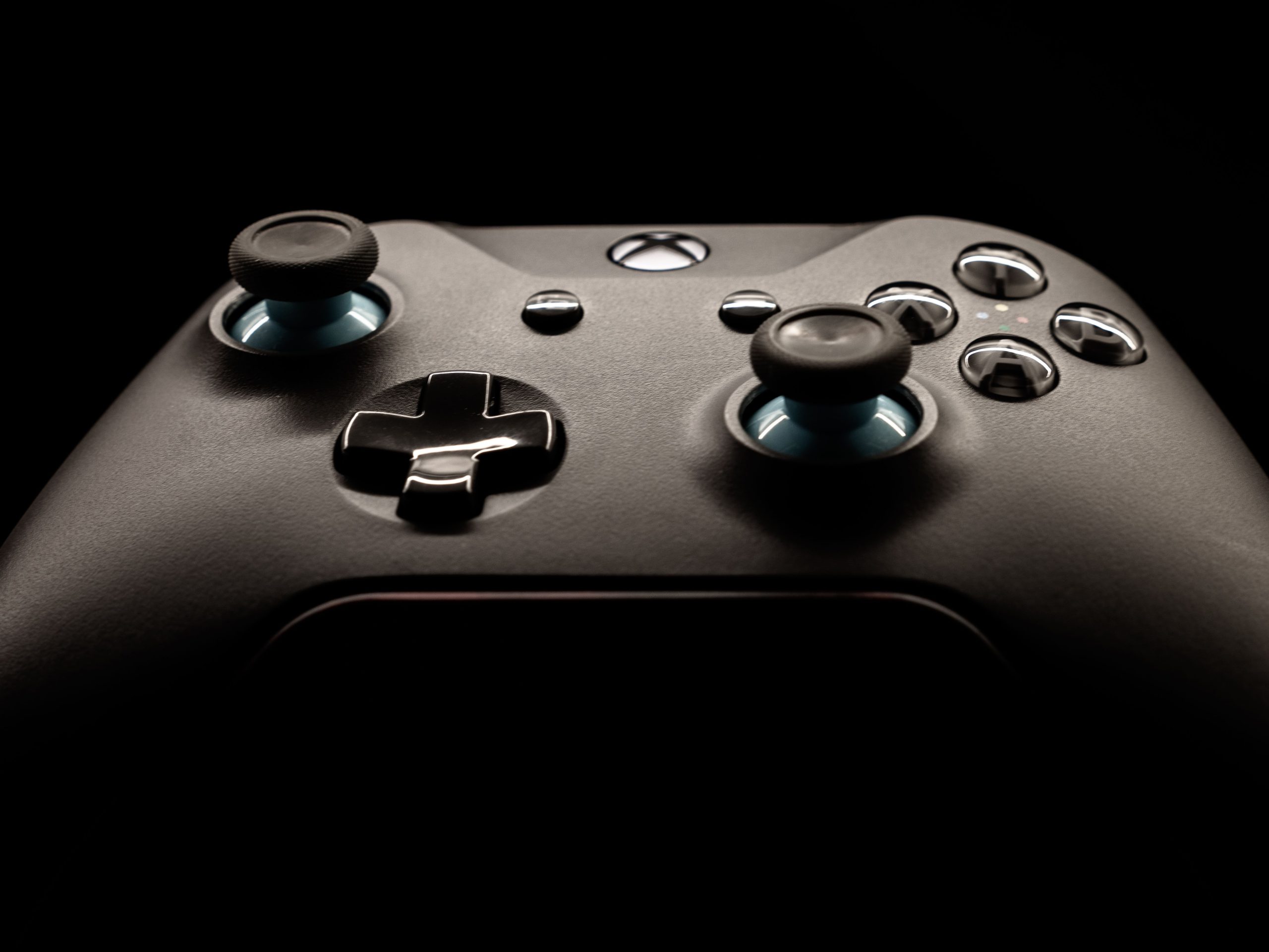 Detailed close-up of a modern gaming controller highlighting its design and buttons